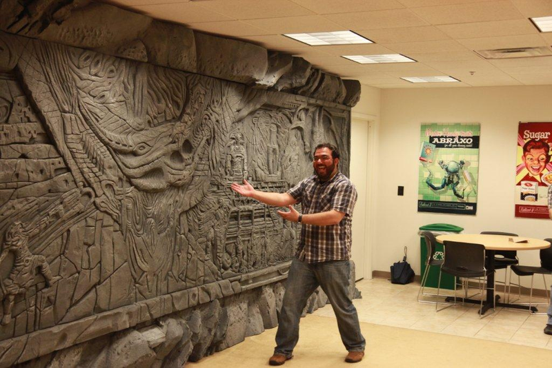 Illustration for article titled Skyrim's Giant Dragon Wall, Installed on a Regular Office Wall